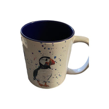 Load image into Gallery viewer, Puffin Mug, beautiful puffin in flight 3 different pictures with blue spot background
